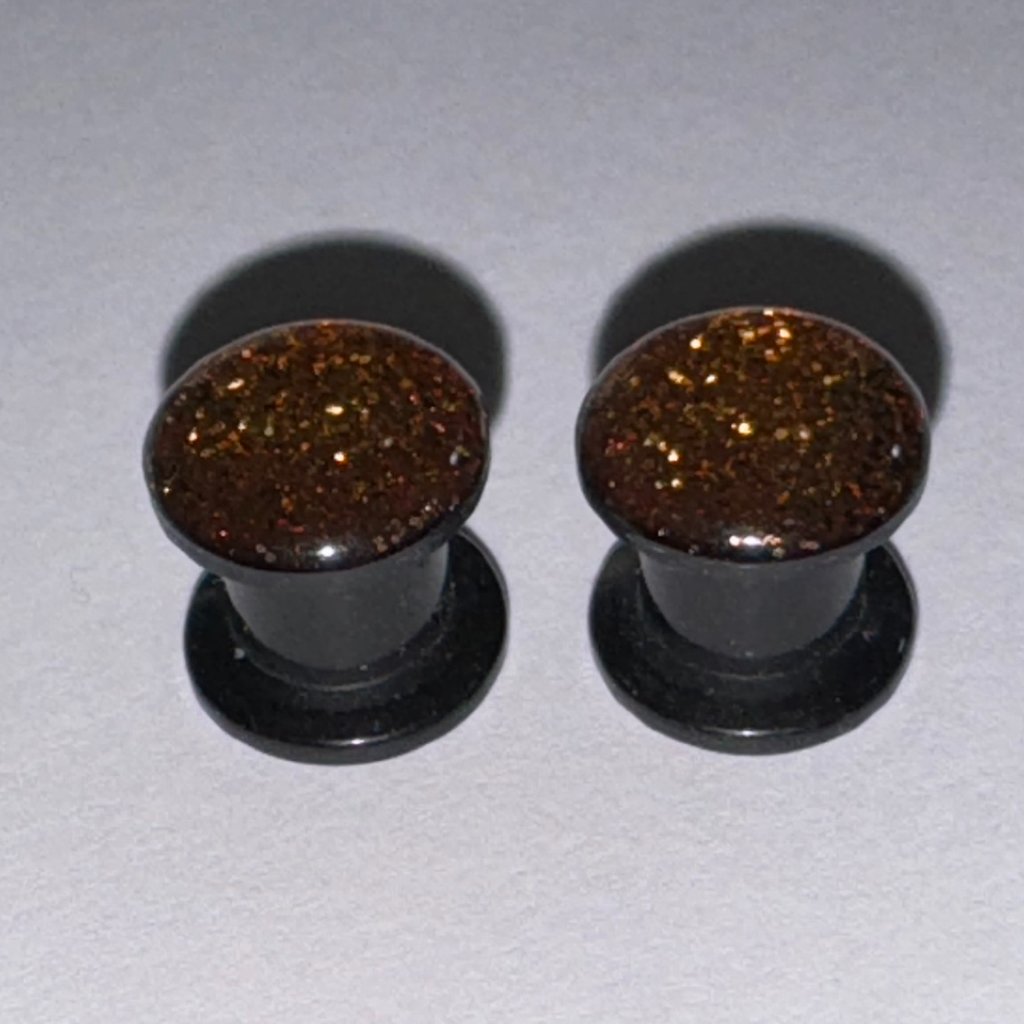 Orange 0 Gauge Glitter Uv Acrylic Plugs